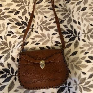 Natural leather saddle bag